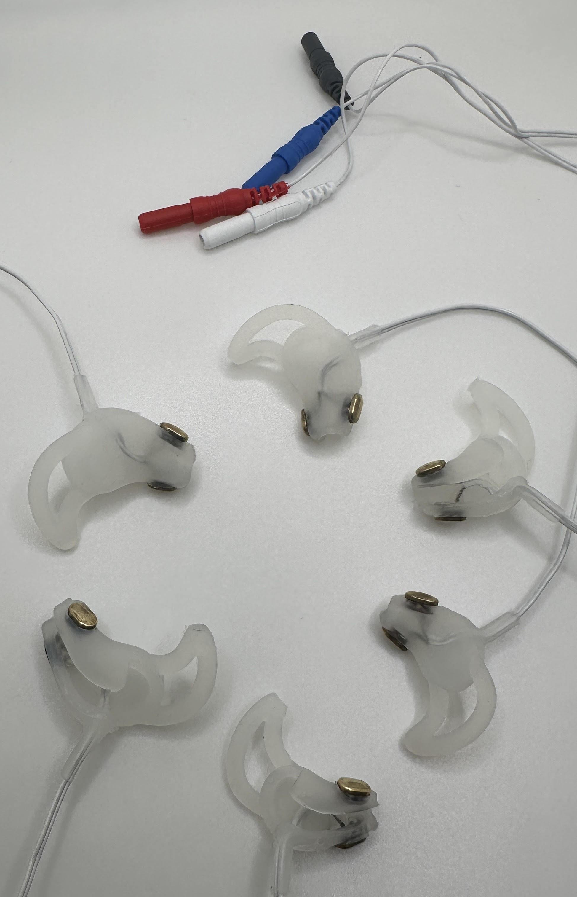 Zircadia reusable in-ear ExG electrodes in three sizes with touchproof leads